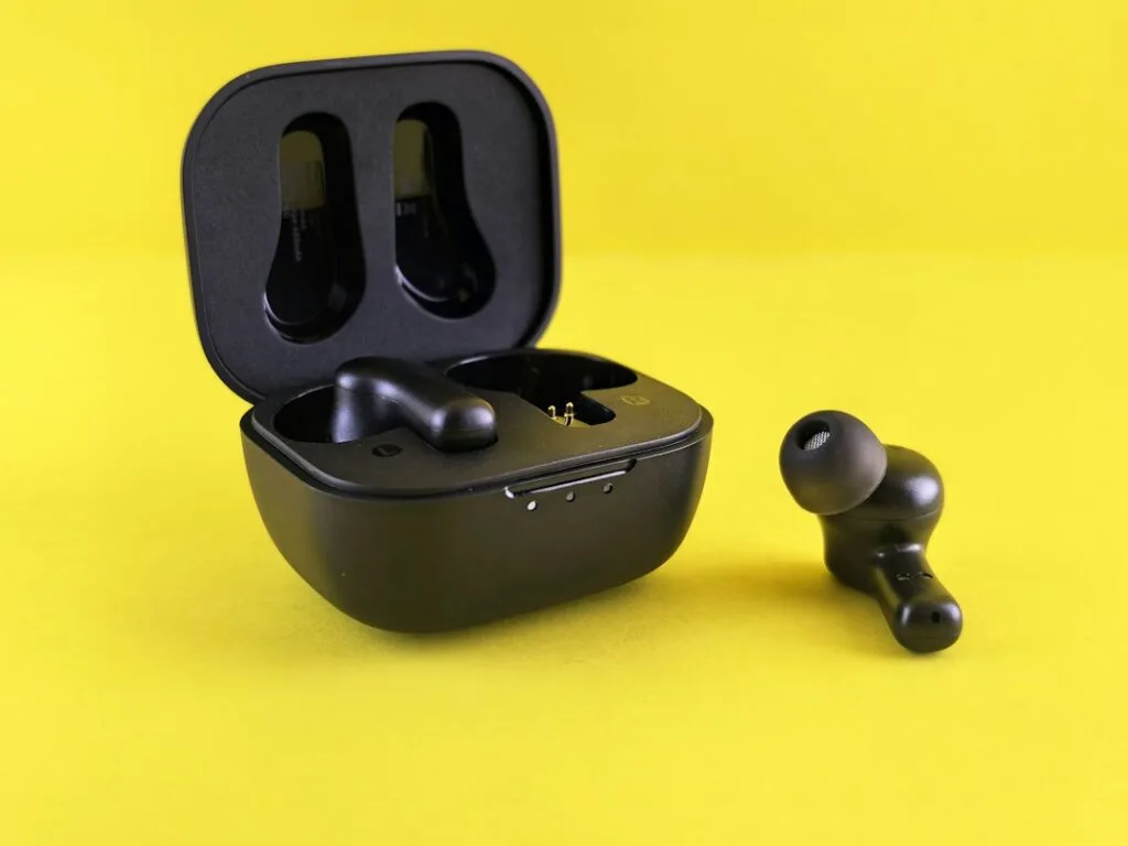 Black wireless earbuds and their charging case