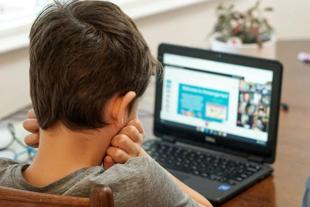 Boy using a laptop